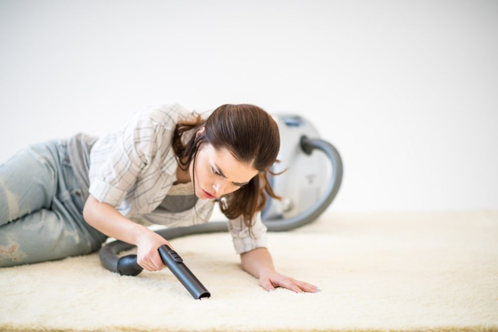 cleaning carpets with vacuum